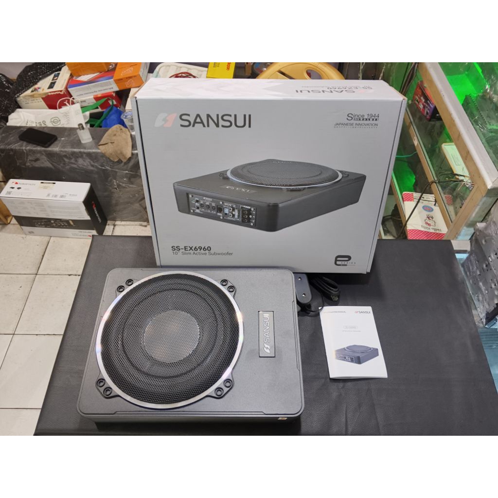 subwoofer kolong sansui audio mobil