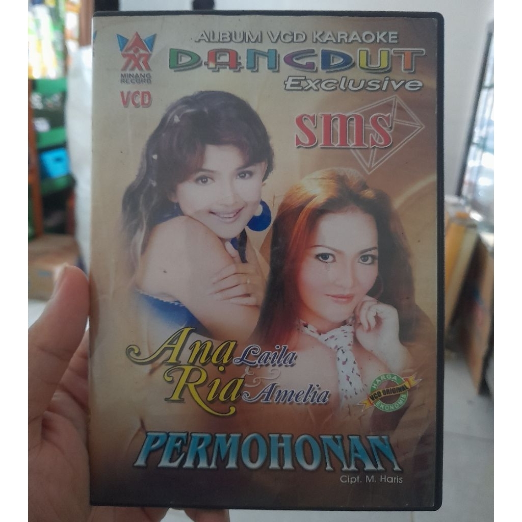 VCD Karaoke Dangdut Exclusive Ria Amelia lagu SMS - Original