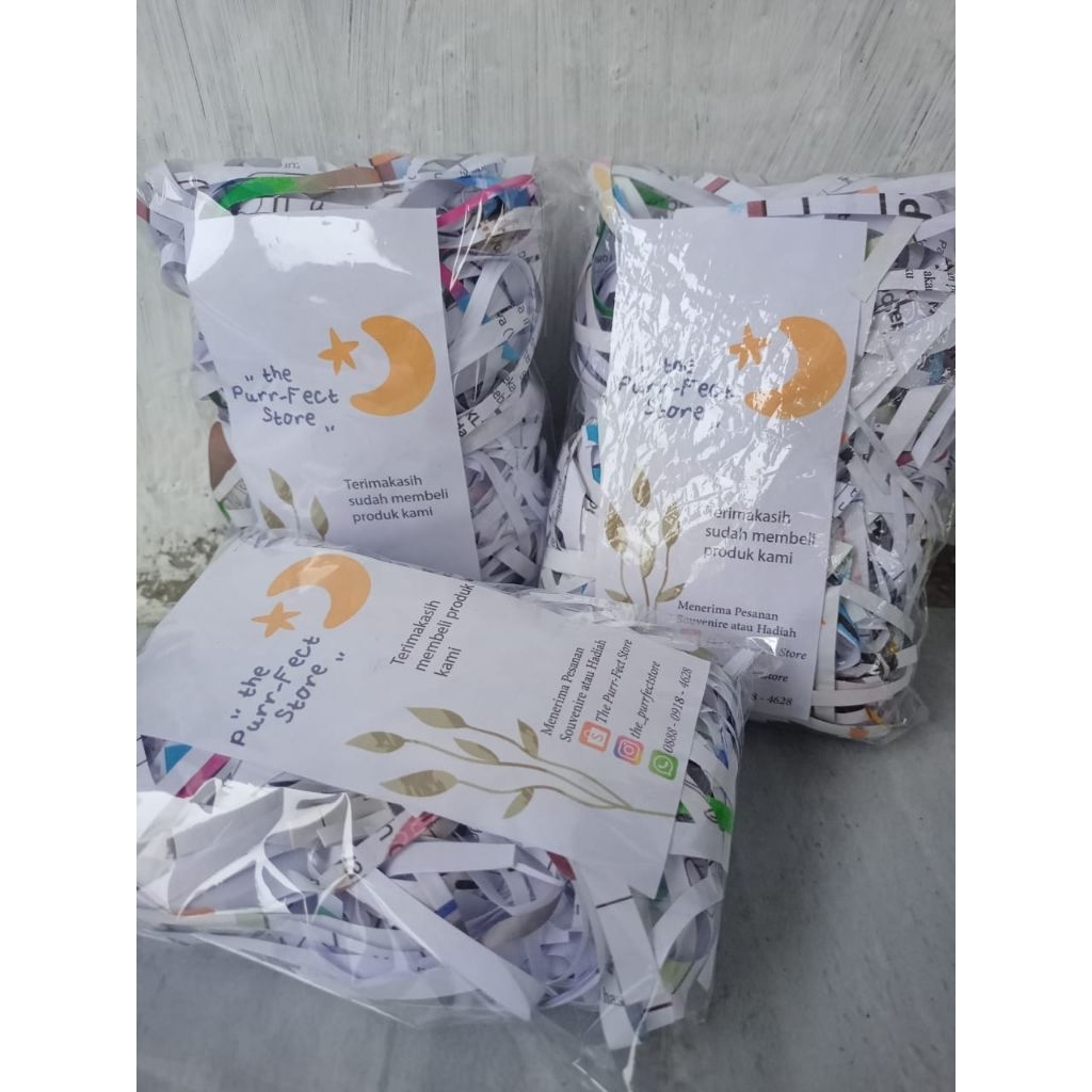 Kertas cacah bekas untuk alas packing