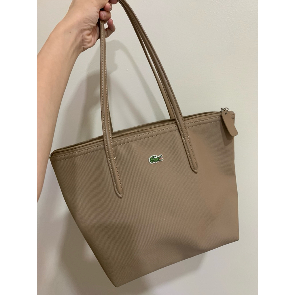 Preloved tas wanita lacoste tanpa cacat warna cream/beige