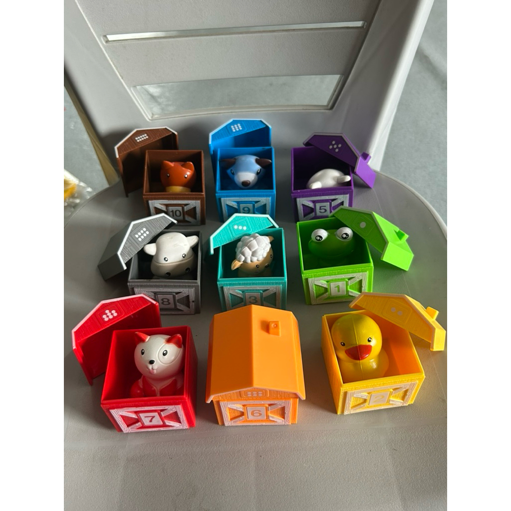 Mainan edukatif hewan dan rumahnya.