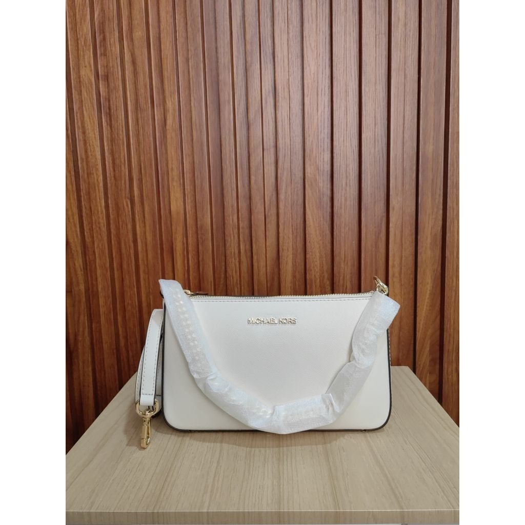 MK Jet Set Travel Crossbody Lt Cream