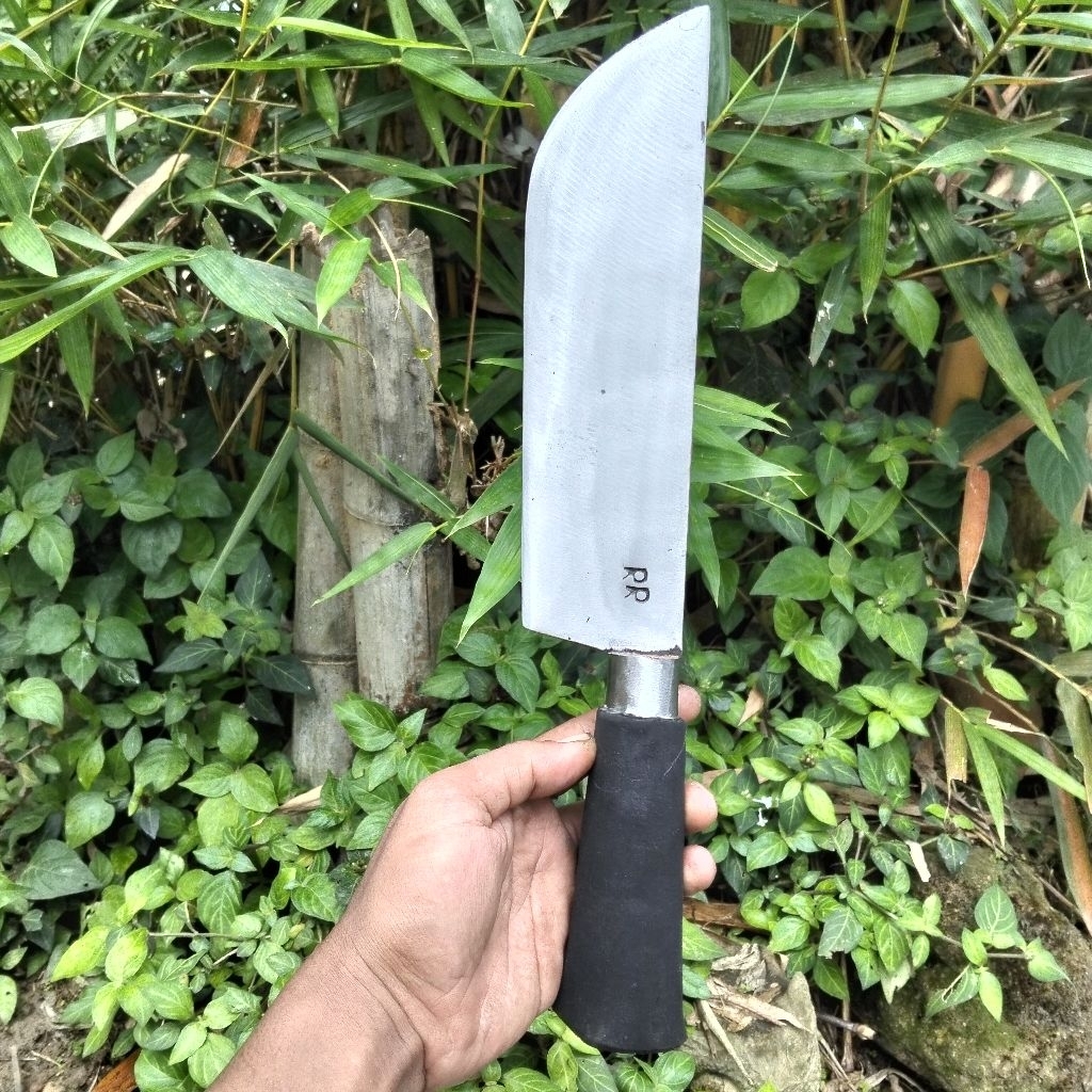 pisau potong ayam daging dan tulang-tulang  paksi tembus sampai bawah gagang asli madura