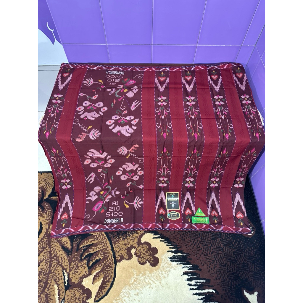Sarung DONGGALA MGT S100 sutra 50%.
