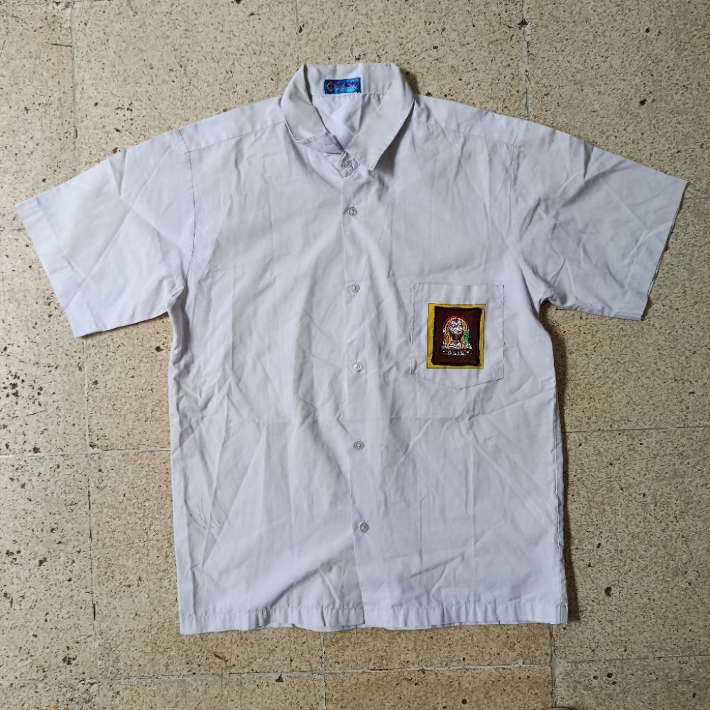 PL baju sekolah putih merk seragam / eagle 61