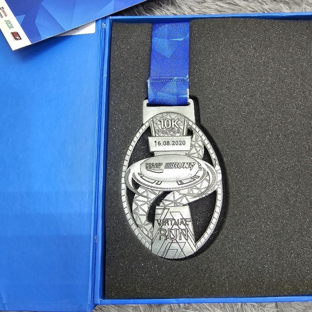 Medali lari finisher pocari