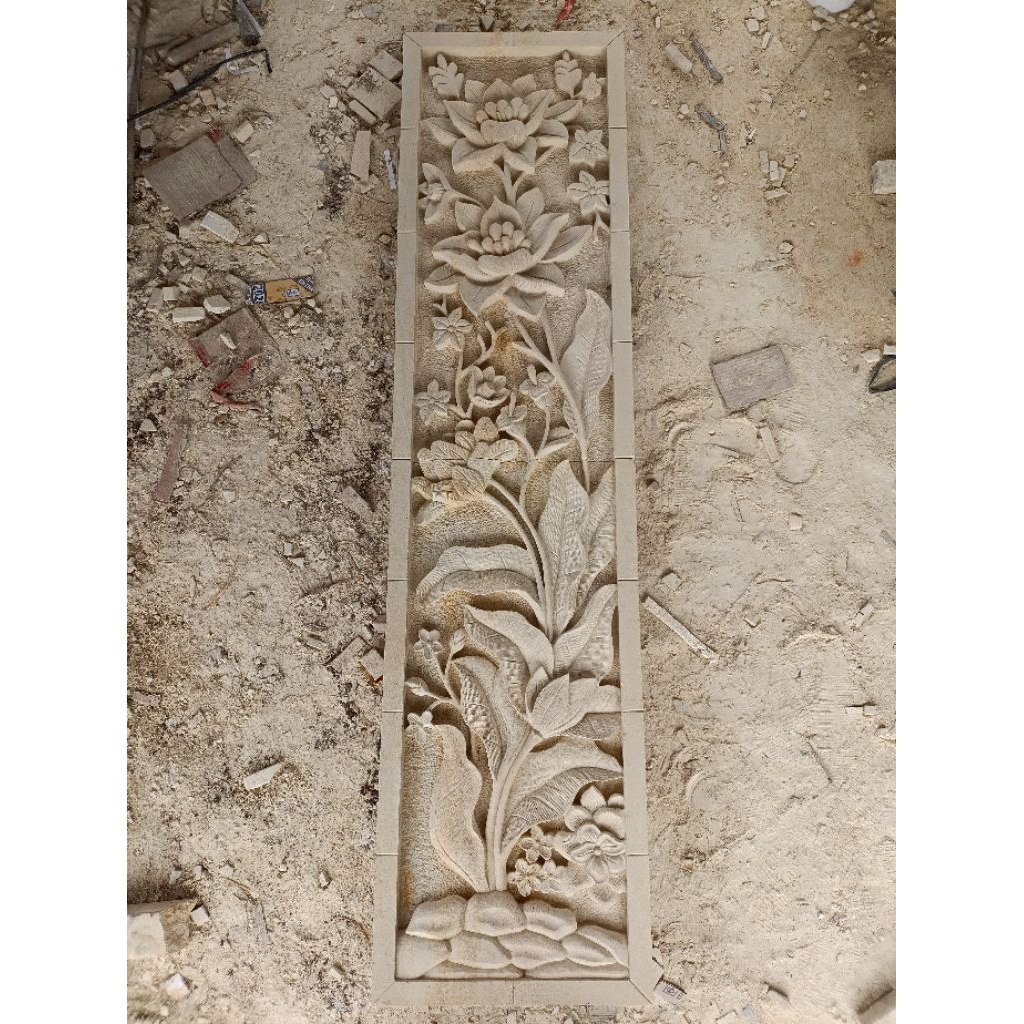 relief batu paras design bunga