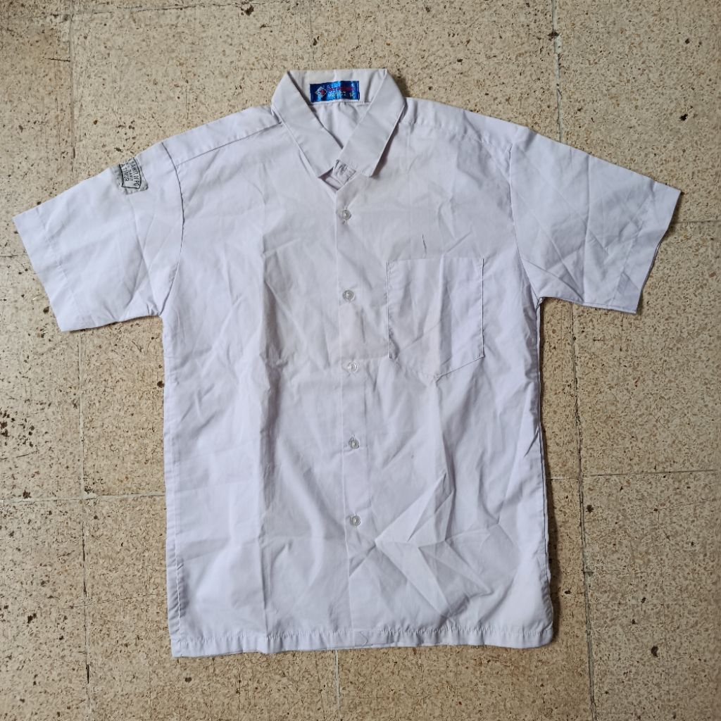 PL baju sekolah putih merk seragam / thunder 42
