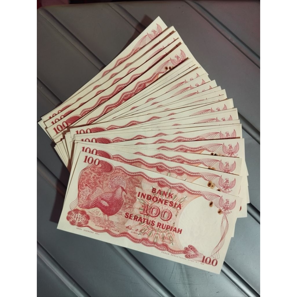 uang kertas 100 rupiah burung Dara 1984 baru Asli