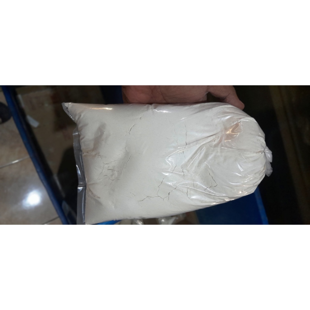 terigu segitiga biru repack 1kg dari karungan 25kg