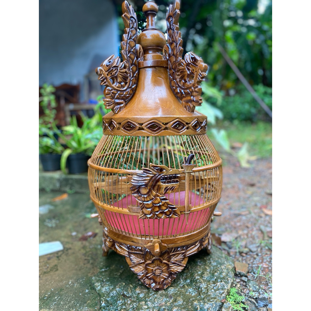 sangkar ukir burung perkutut motif minion naga