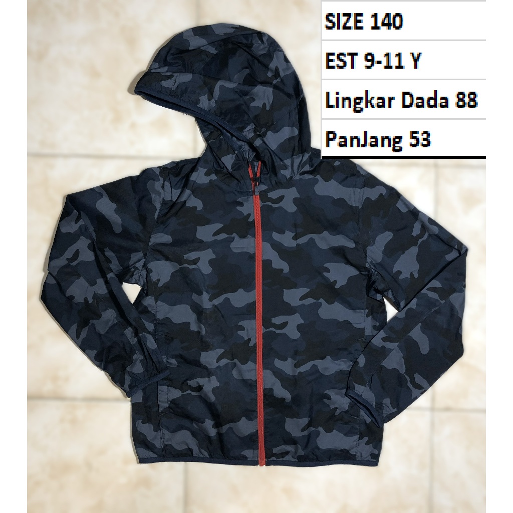 UNIQLO - Jaket Parasut Waterproof Hoodie Pocketable Anak Premium Second Preloved