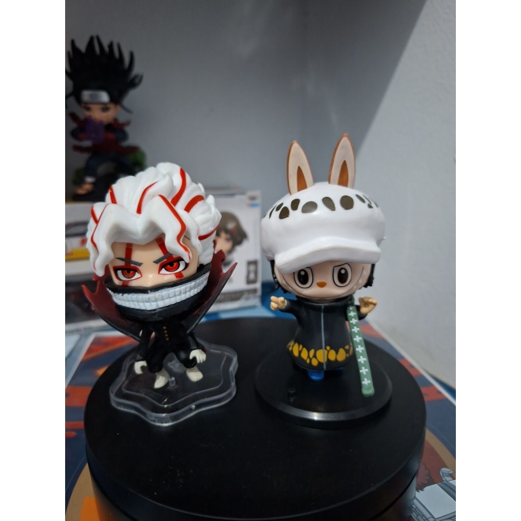 Figure Law dan Okarun