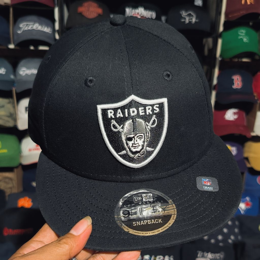 Topi snapback New Era Raiders