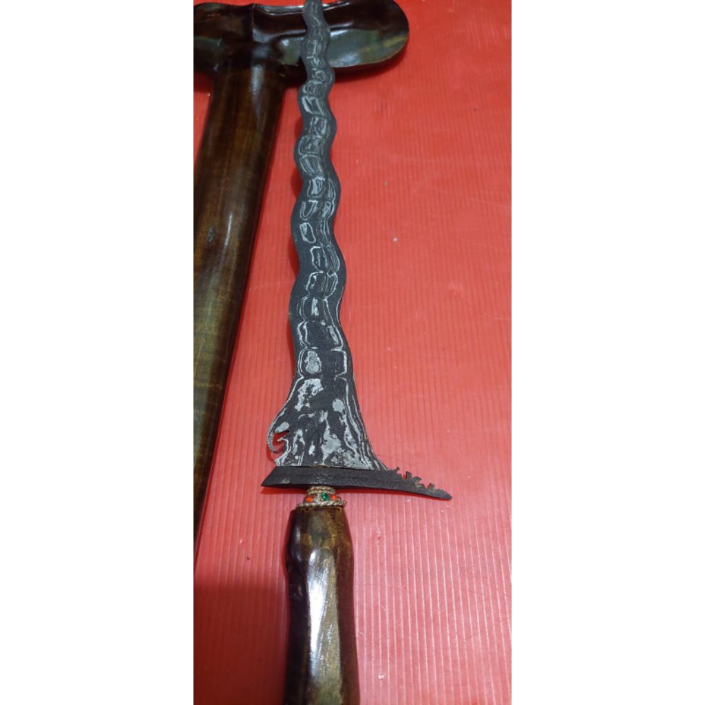 keris melati tumpuk luk