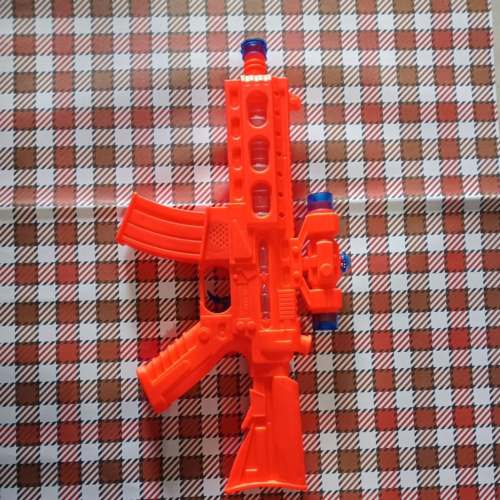 mainan senapan anak menyala