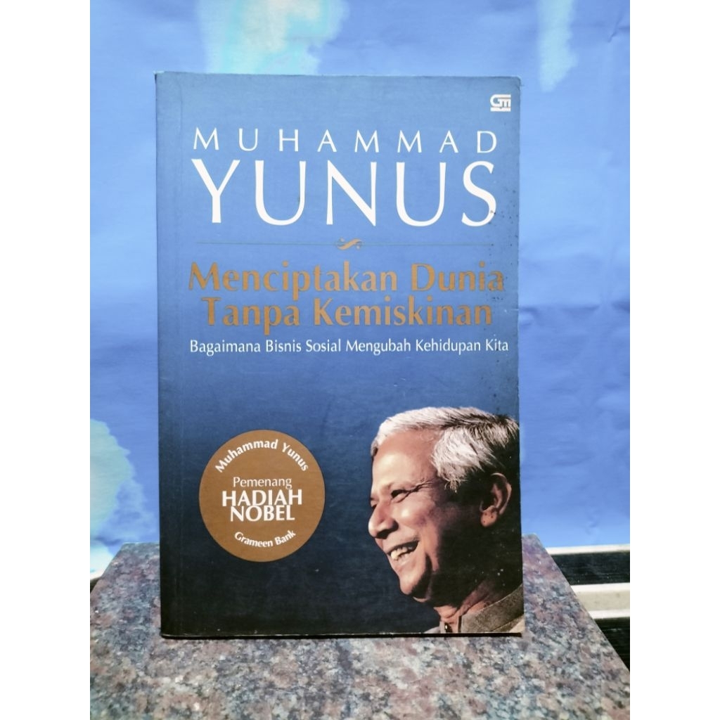 BUKU BEKAS MENCIPTAKAN DUNIA TANPA KEMISKINAN OLEH MUHAMMAD YUNUS