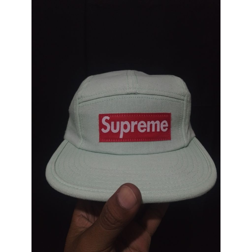 TOPI SUPREME
