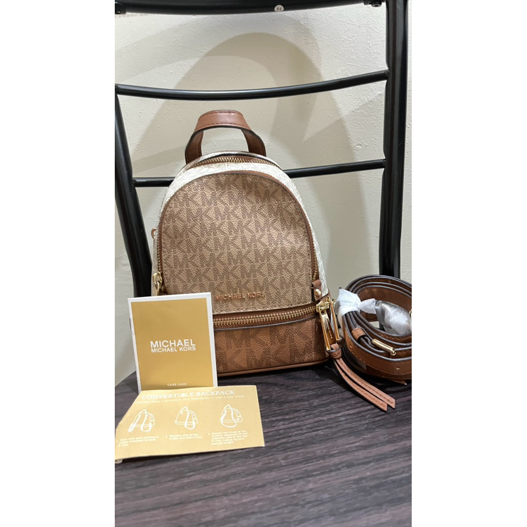 Preloved tas merk MK Rhea mini signature 100% authentic bisa backpack dan sling