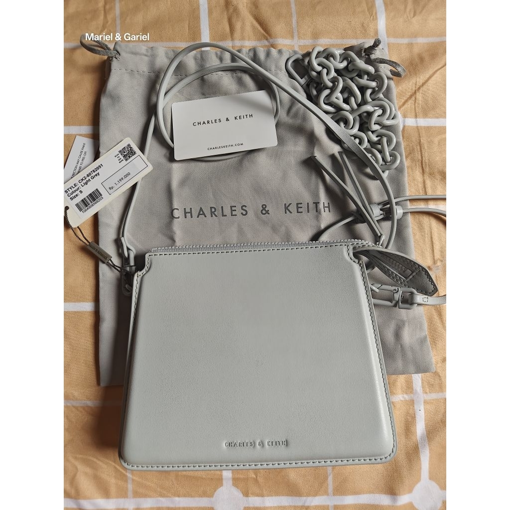 Charles and Keith camellia trapeze crossbody bag handbag Wallet Clutch