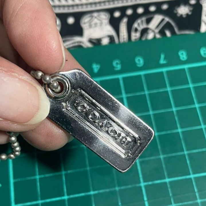 Bag Charm Hang Tag Biji Lada Coach Metal Silver Authentic
