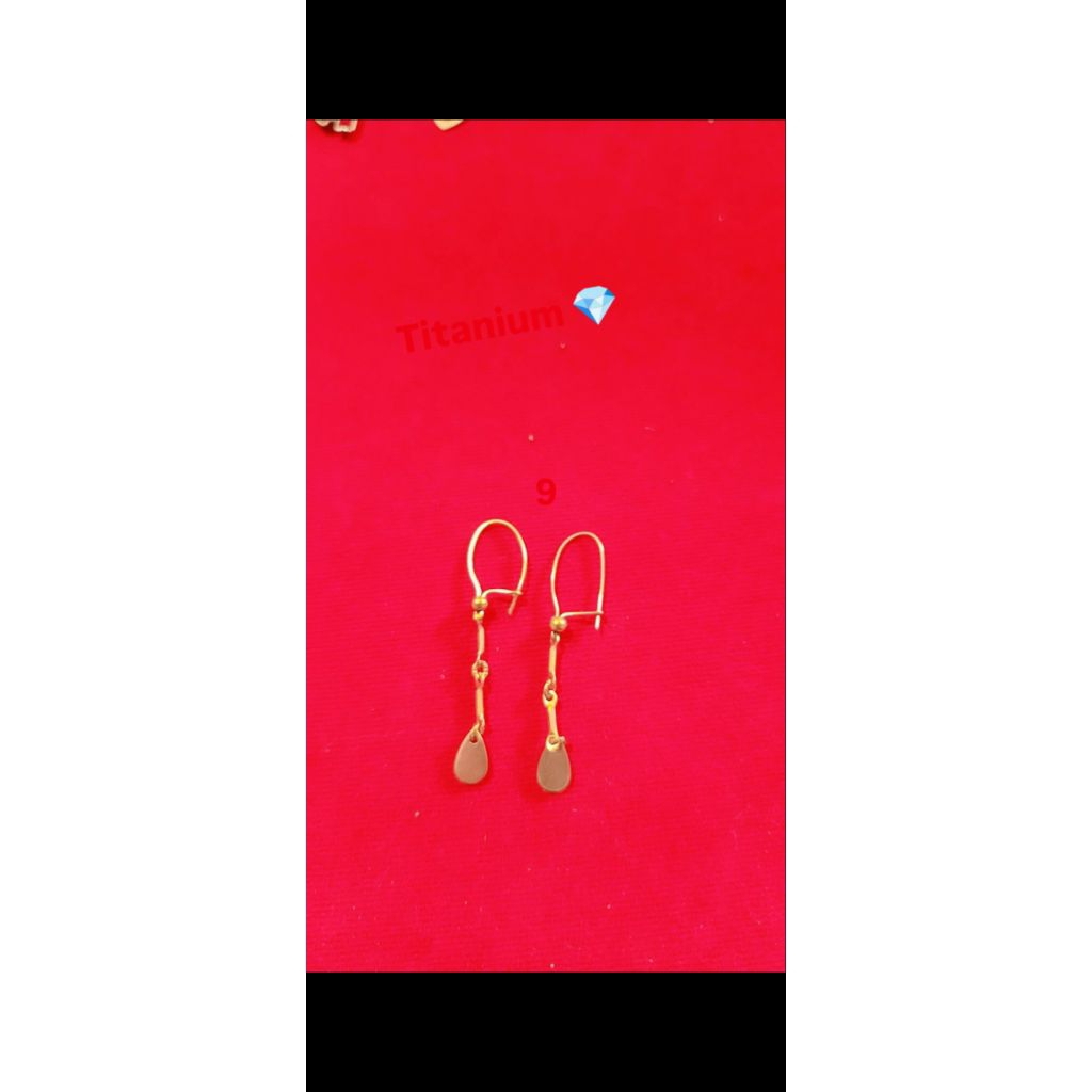 anting titanium asli