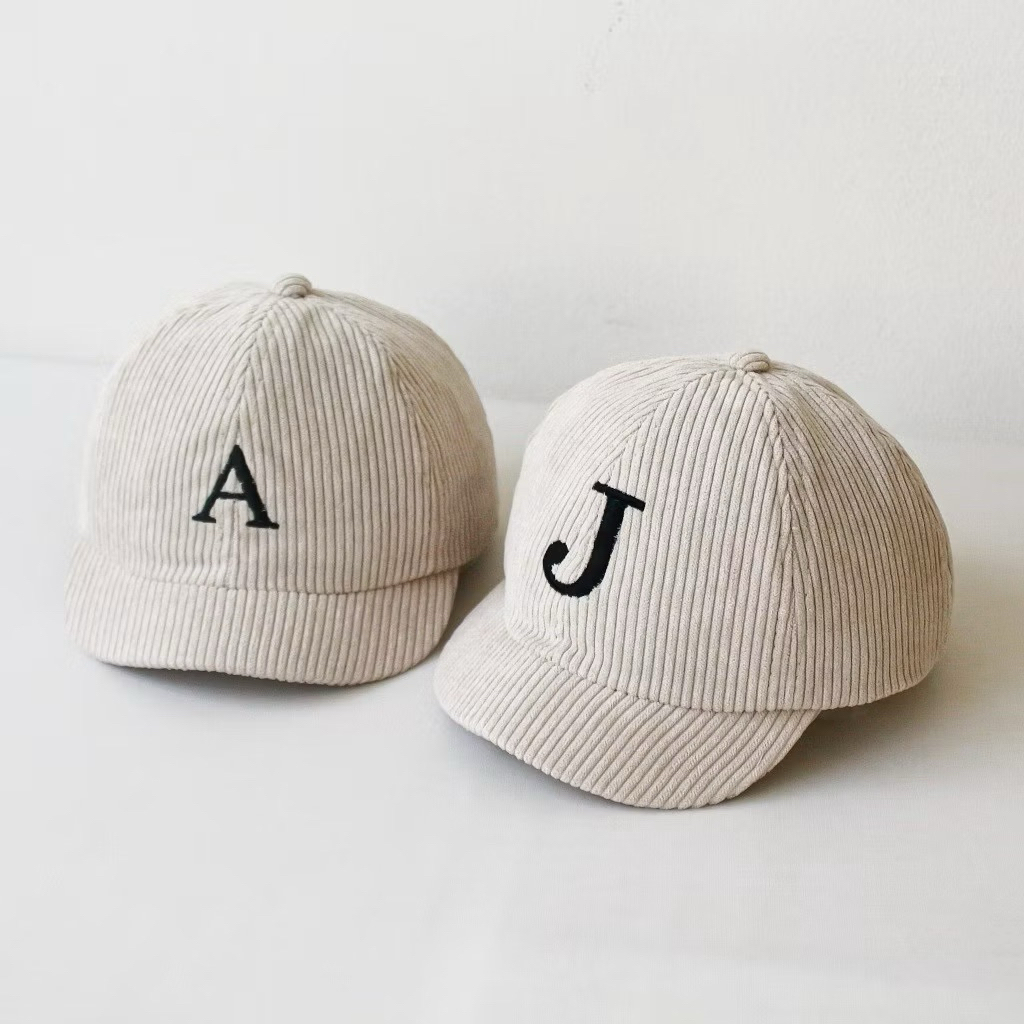 topi anak cream corduroy alfabet A-z