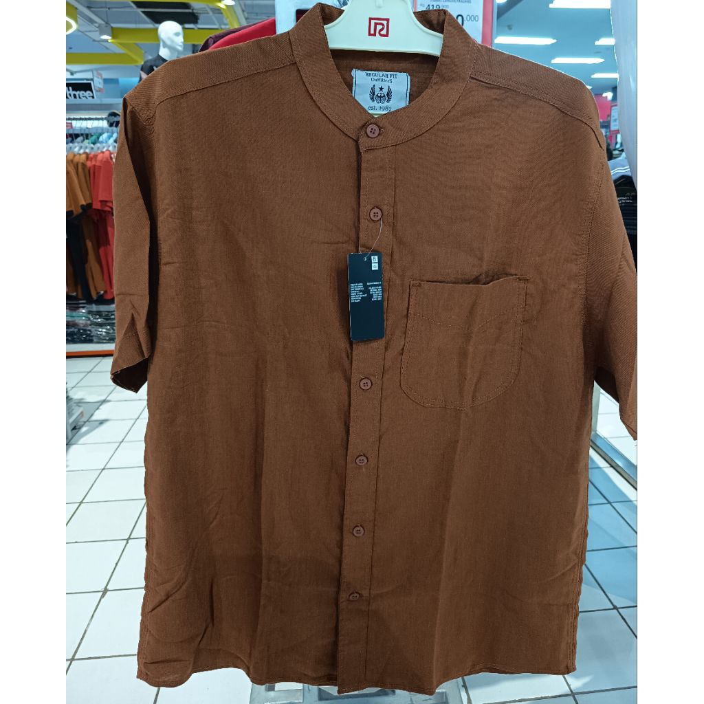 KEMEJA FLANEL BY DESIGN CORP