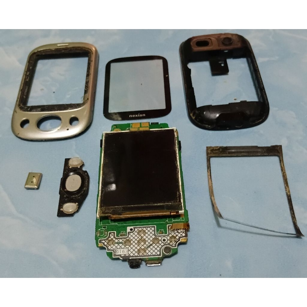 Suku Cadangan Sperpat Hp Nexian NX-G311 Copotan Original Normal