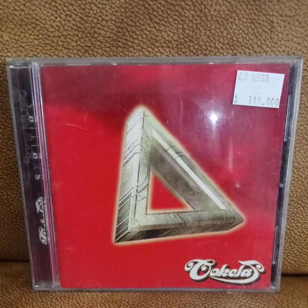 CD Compact Disc Cokelat - Segitiga