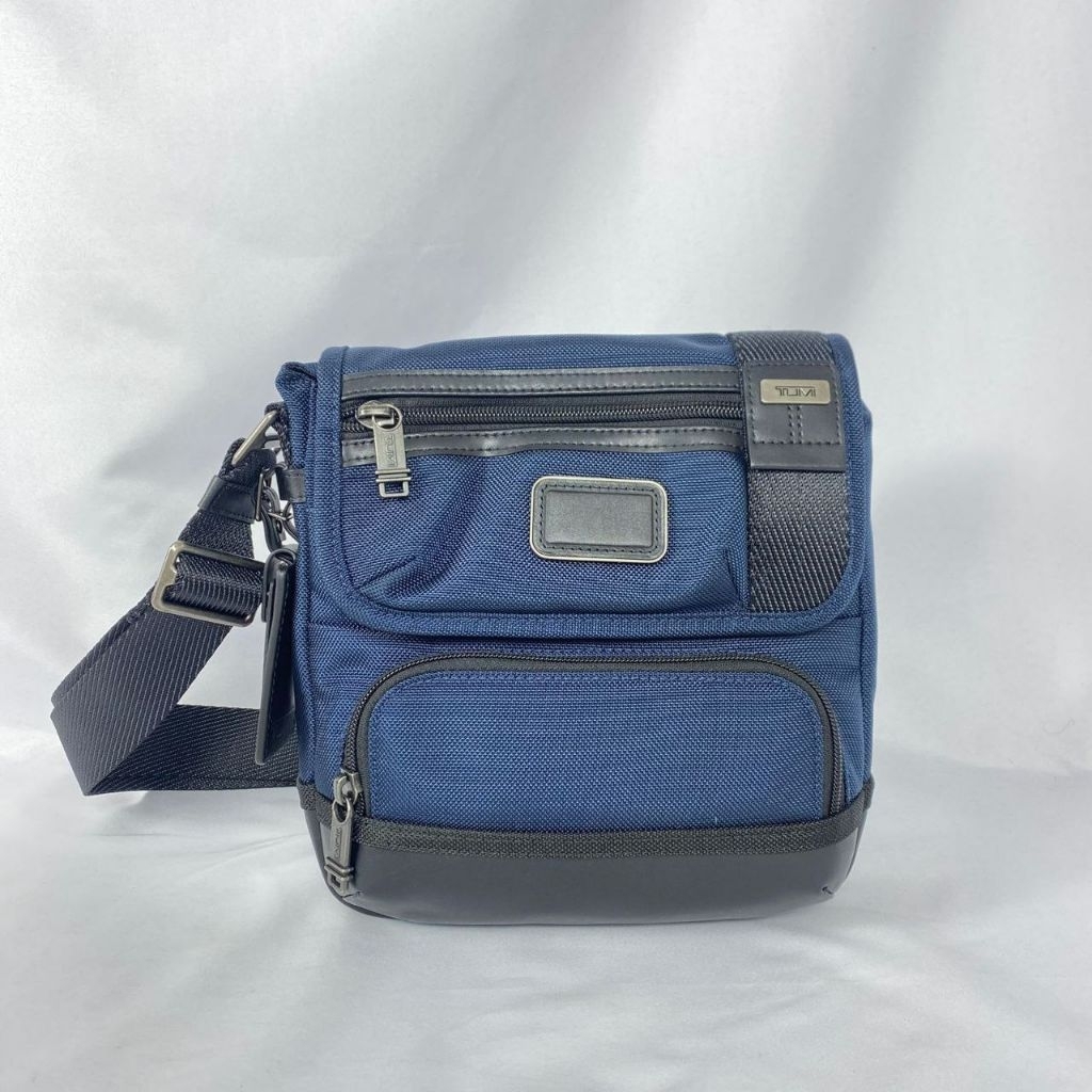 Tumi kerby sling crossbody blue mlt