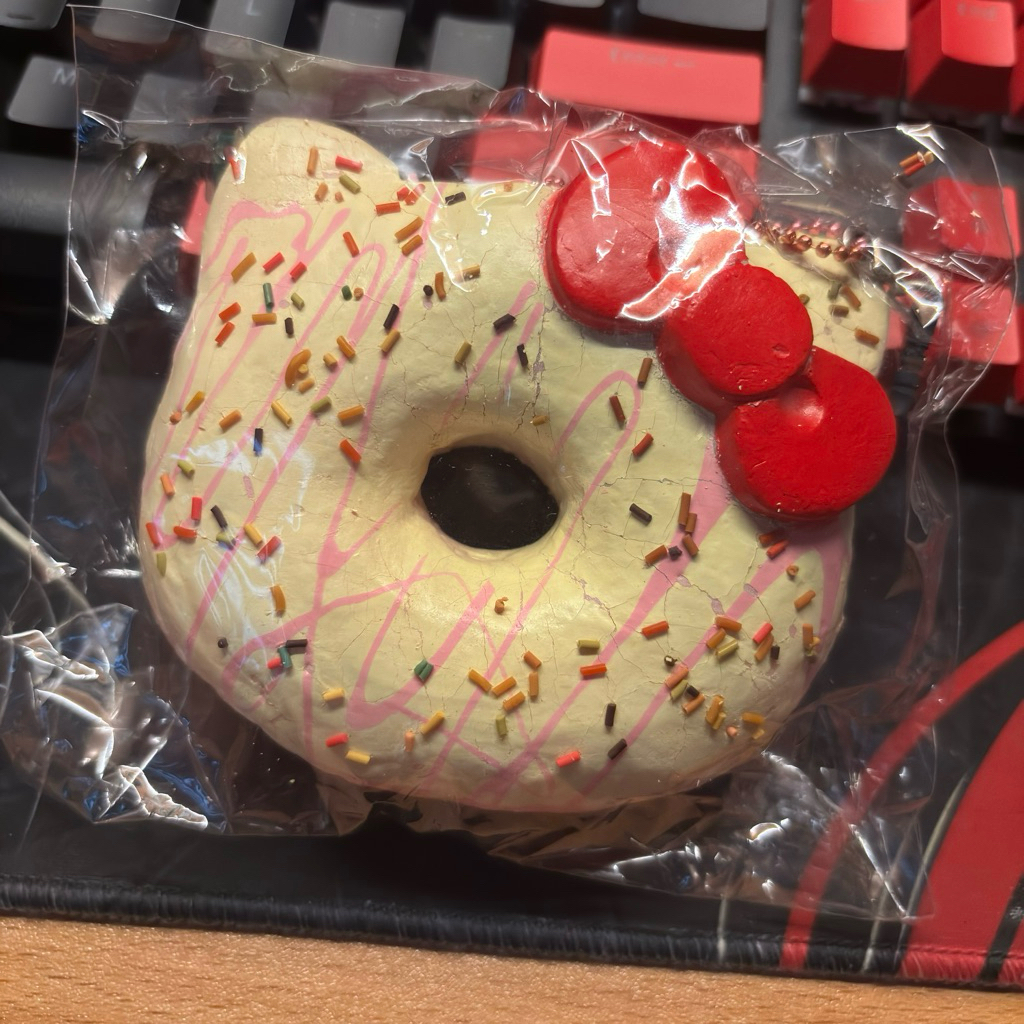 preloved squishy hk donut yellow with pink drizzle hello kitty