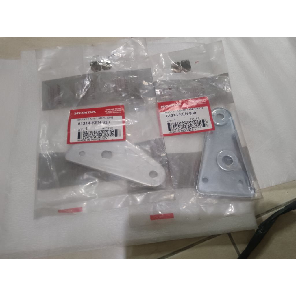 breket lampu depan honda original ahm kanan-Kiri set0--61313-KEH-930