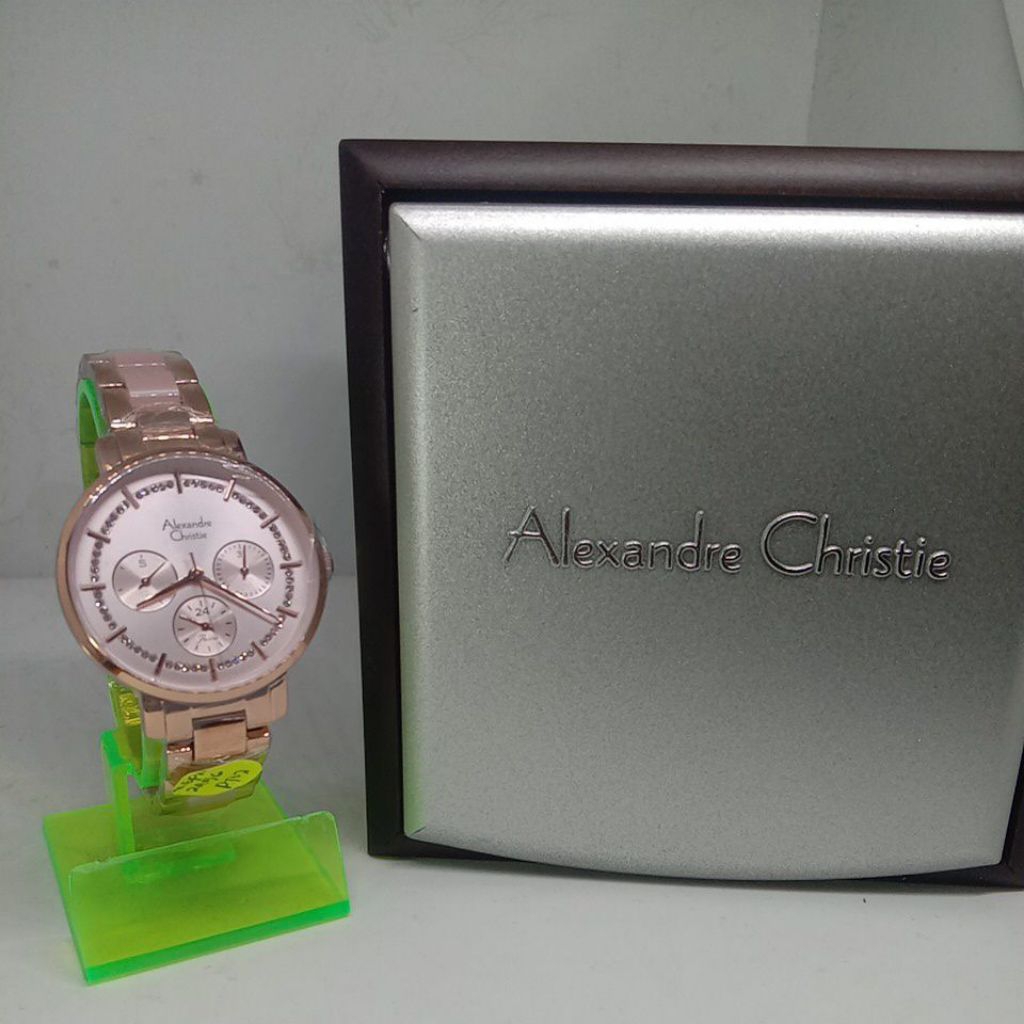 Jam Tangan Alexandre Christie (2A56BF) Tali Rantai Warna Gold Kombinasi Keramik Warna Pink (Pemakaia