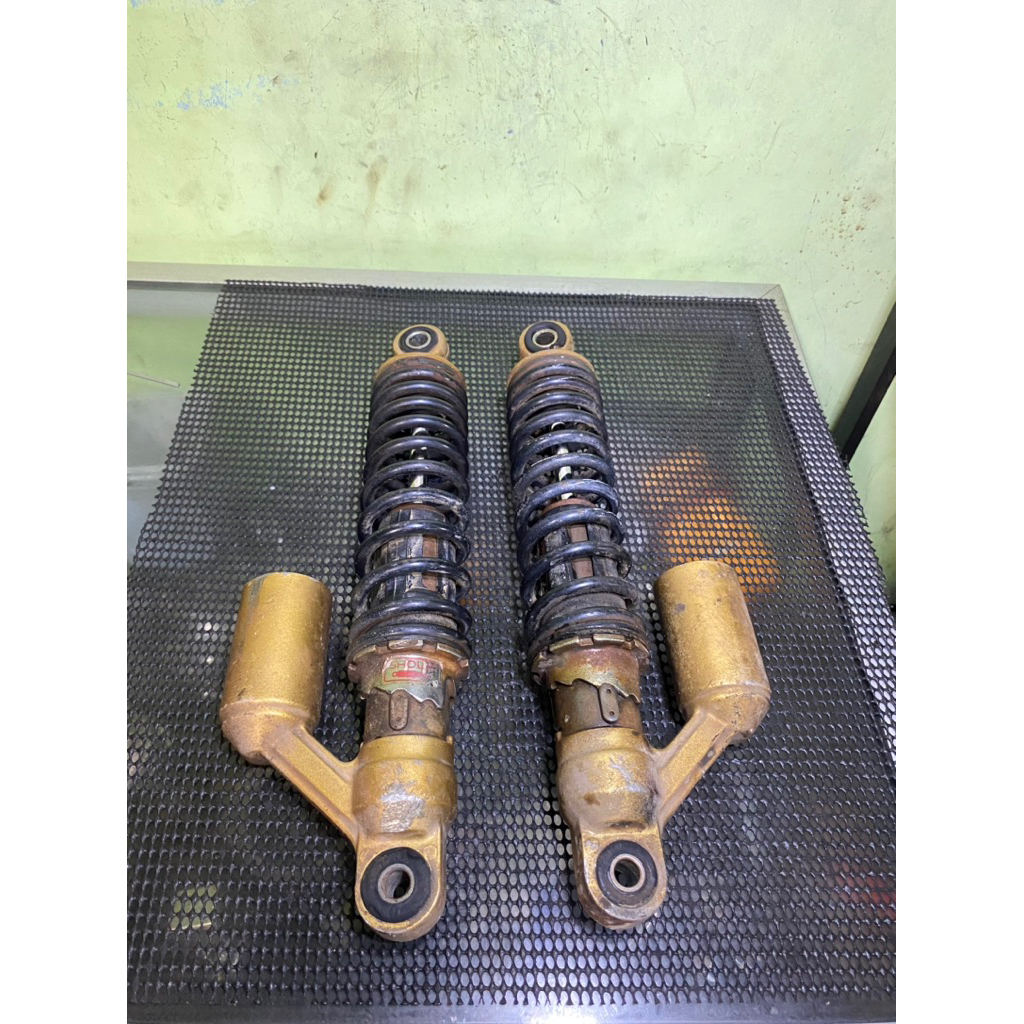 shock belakang tiger revo ori copotan