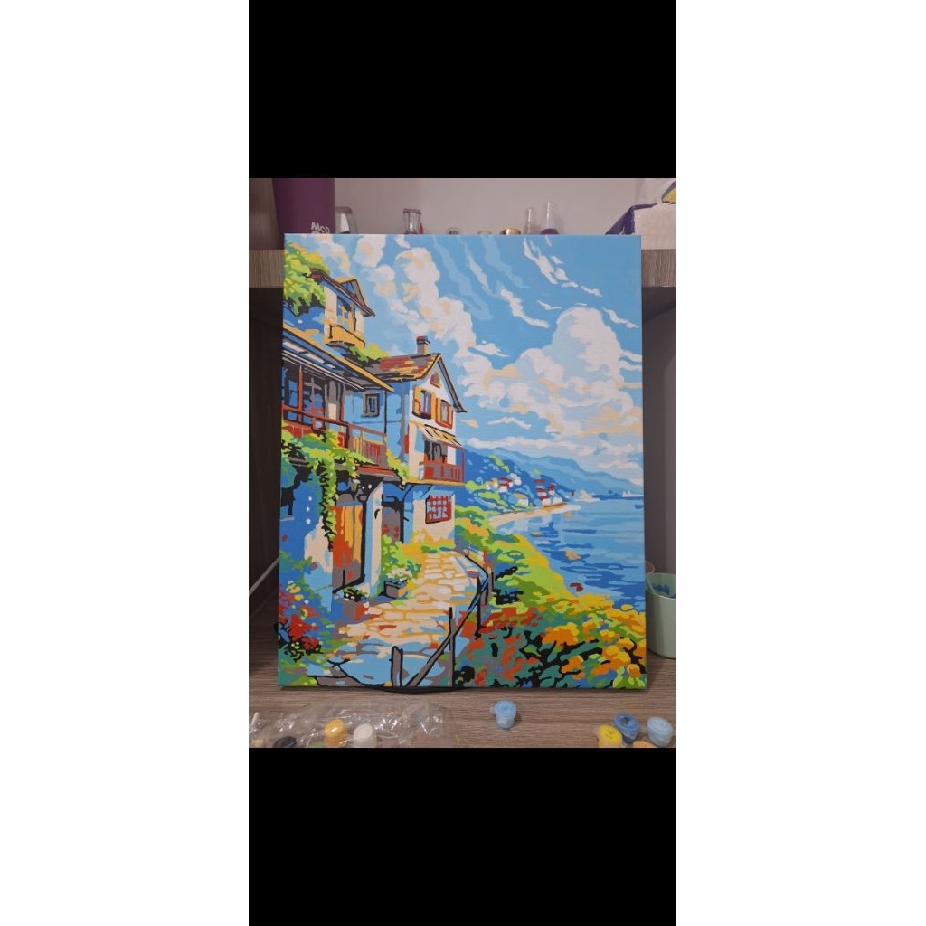 lukisan kanvas rumah tepi laut