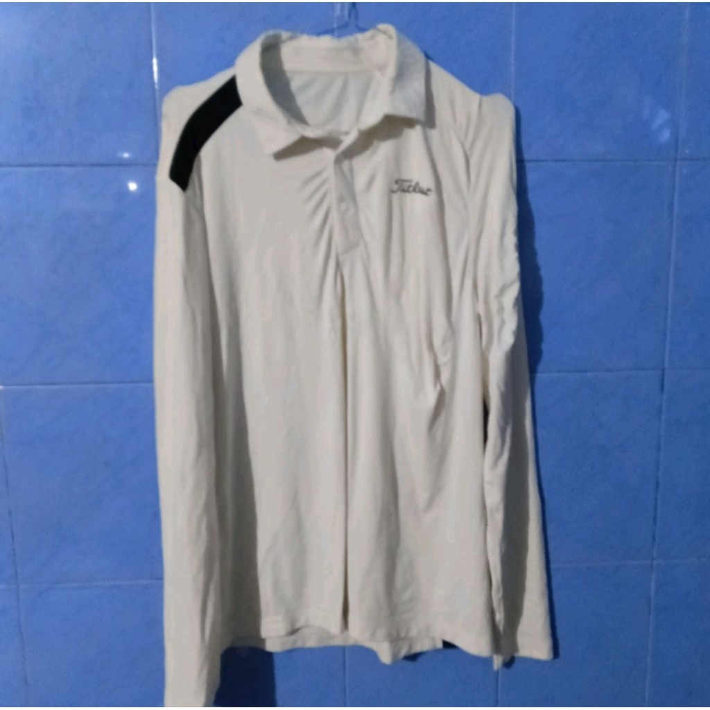 titleist polo golf putih .