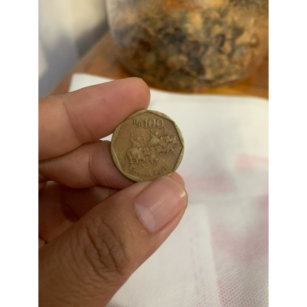 uang koin 100 karapan sapi