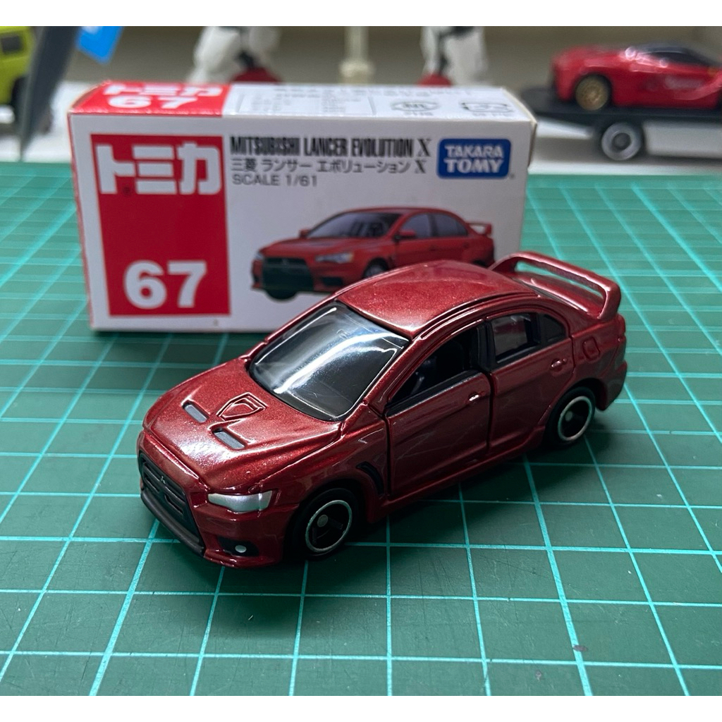 Tomica Mitsubishi Evo X ( merah )