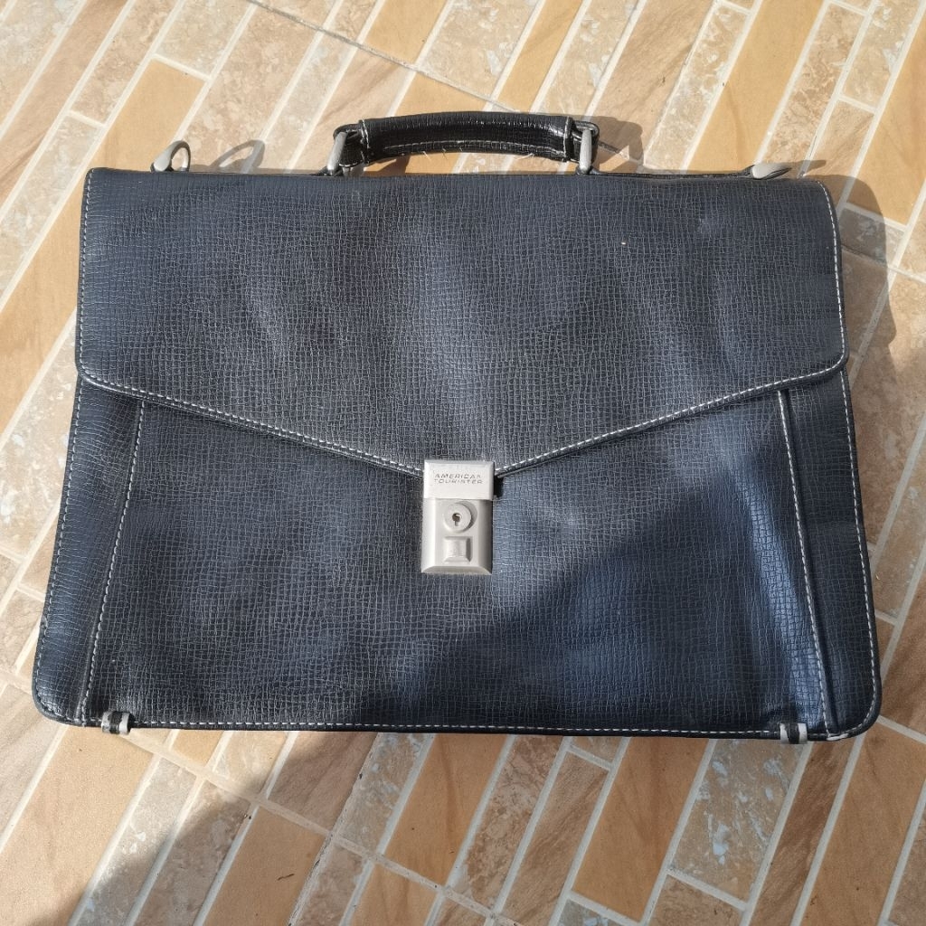 A509. TAS LAPTOP DOKUMEN AMERICAN TOURISTER KULIT WARNA HITAM PRELOVED