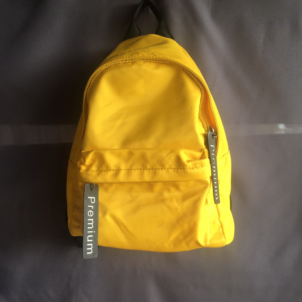 Preloved tas mini ransel miniso warna kuning