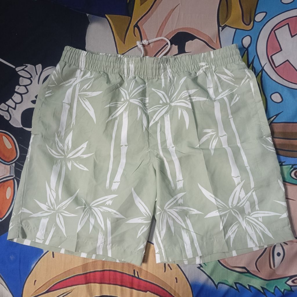 celana pendek stussy tour