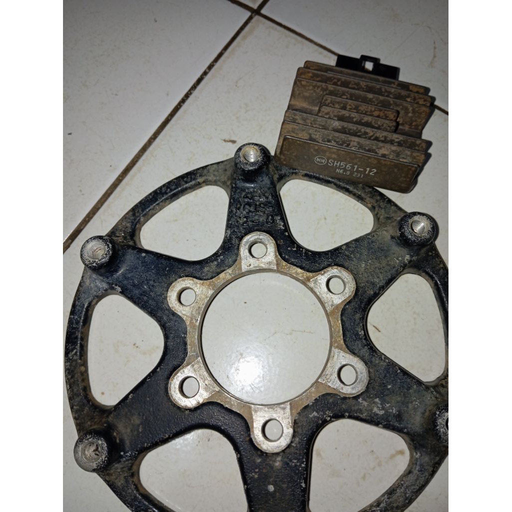 plendes breket piring cakram honda tiger revo