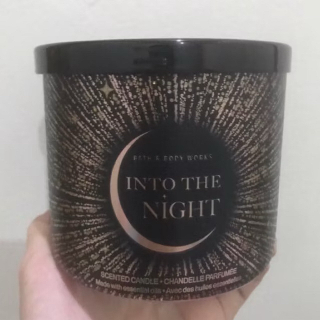 bath and body works candle 3 wick into the night.