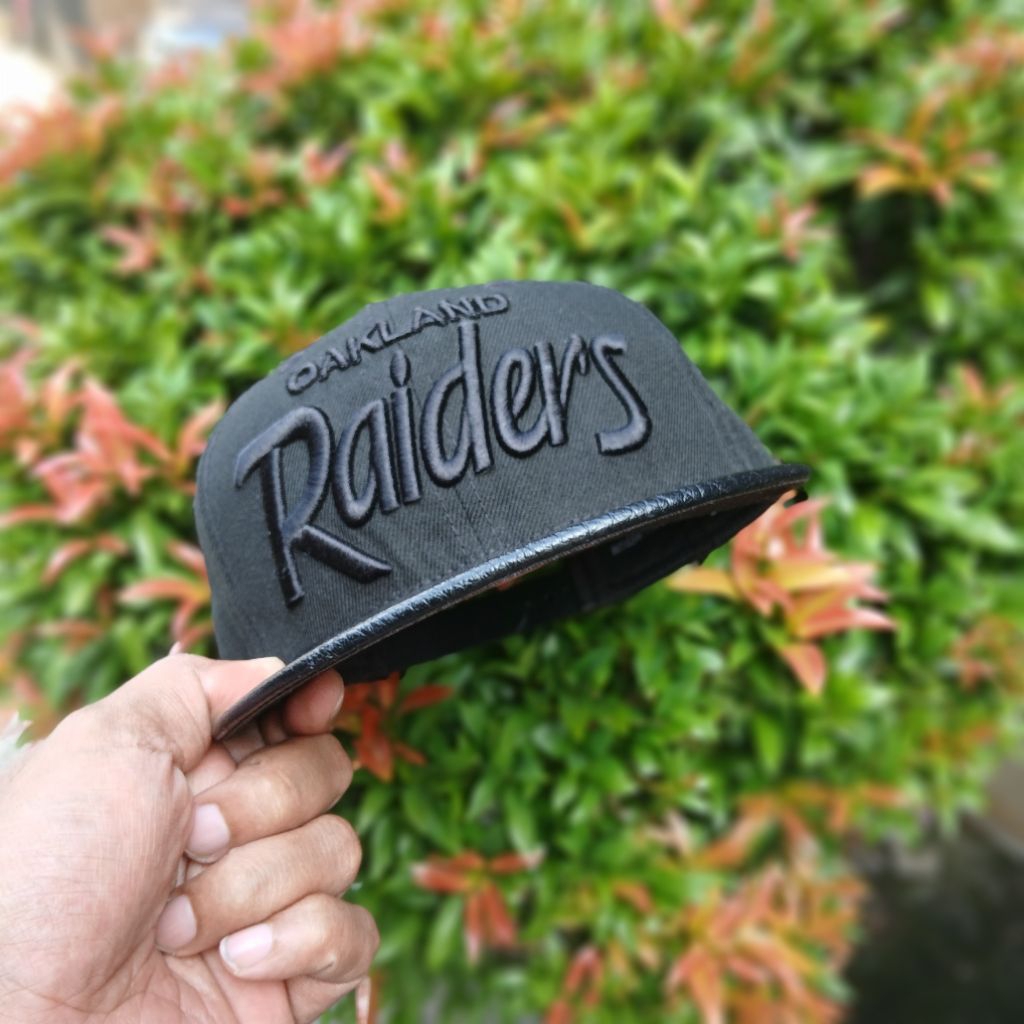 Topi Snapback New Era 9Fifty NFL Raider Script Black size S/M