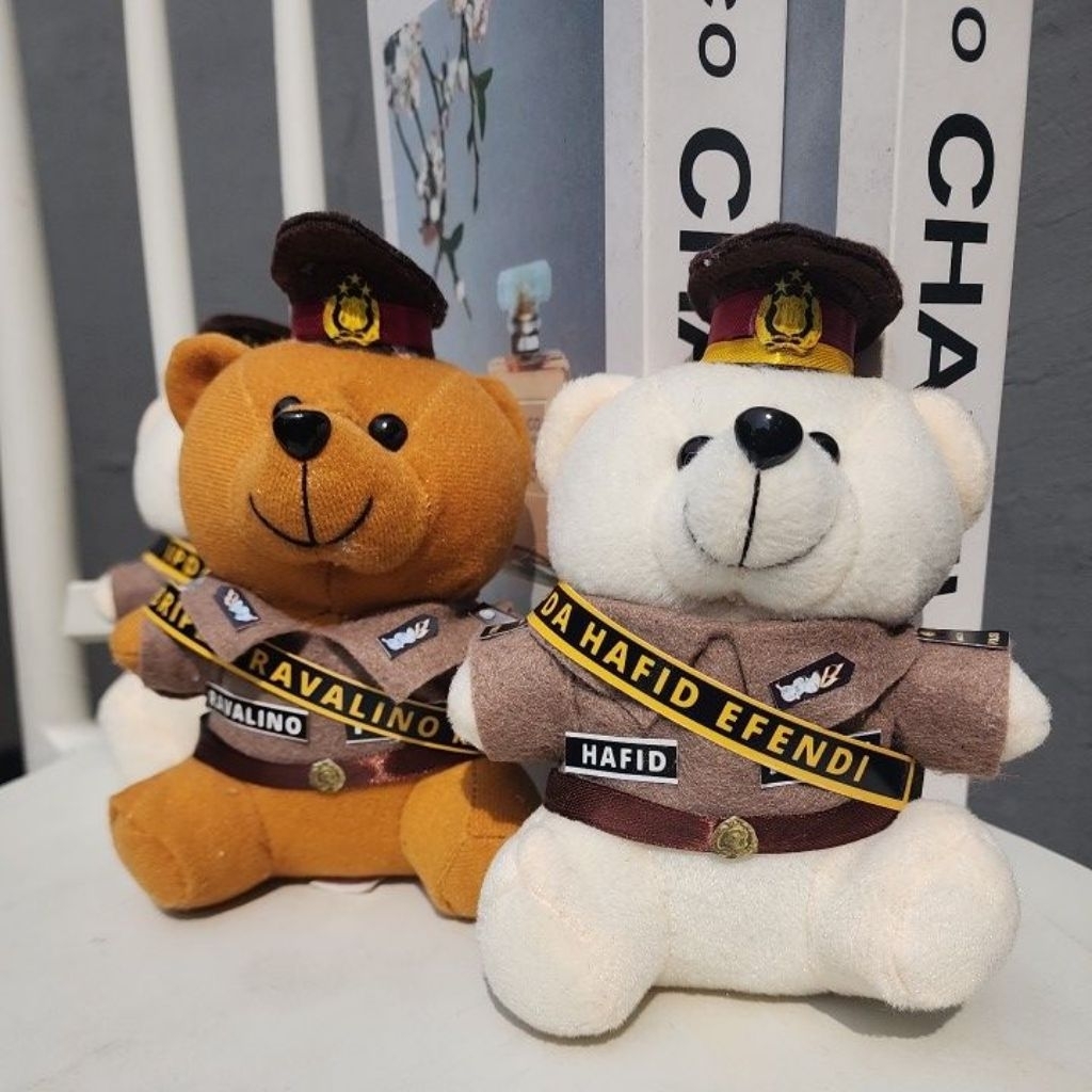 boneka polisi selempang pelantikan polisi