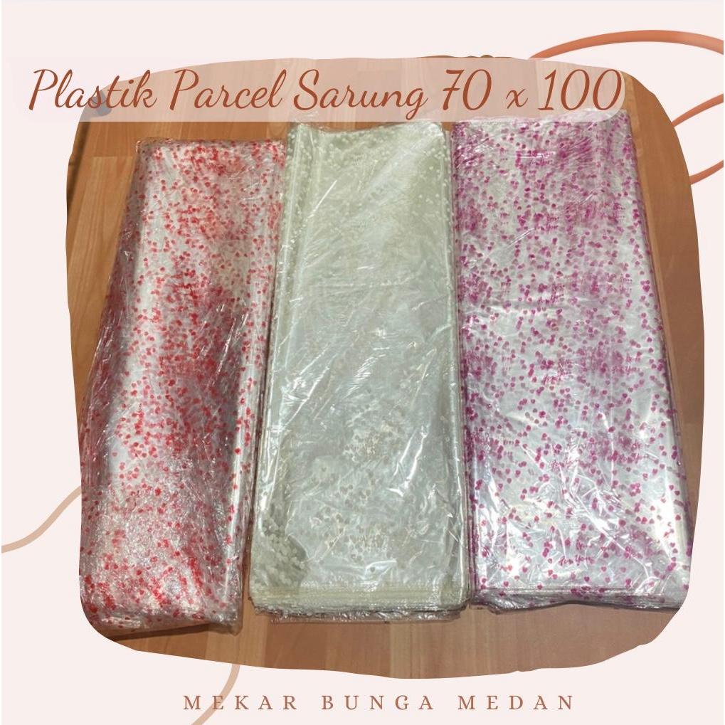 (10 LEMBAR) - PLASTIK PARCEL 70 X100 / PLASTIK OPP PARSEL BUNGKUS BONEKA HAMPERS LEBARAN TAHUN BARU 