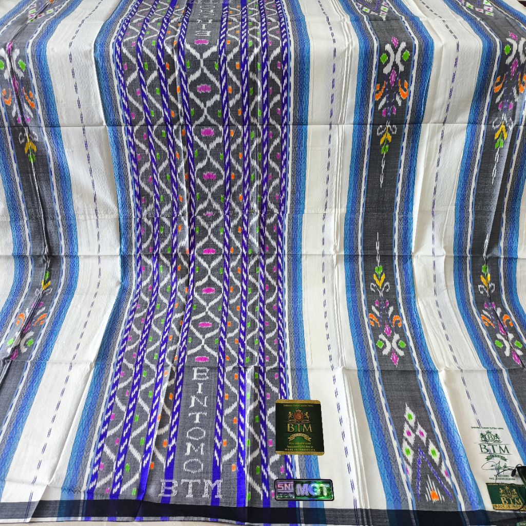 BTM TIPE MGT EDISI WARNA PUTIH MOTIF GUNUNG TIMBUL JAHIT TENGAH