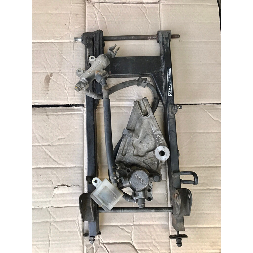 ARM SET PENGEREMAN BELAKANG SUPRA 125 FI K41 ORIGINAL