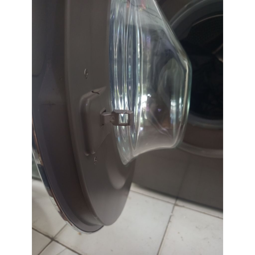 pintu mesin cuci Lg bkaan depan